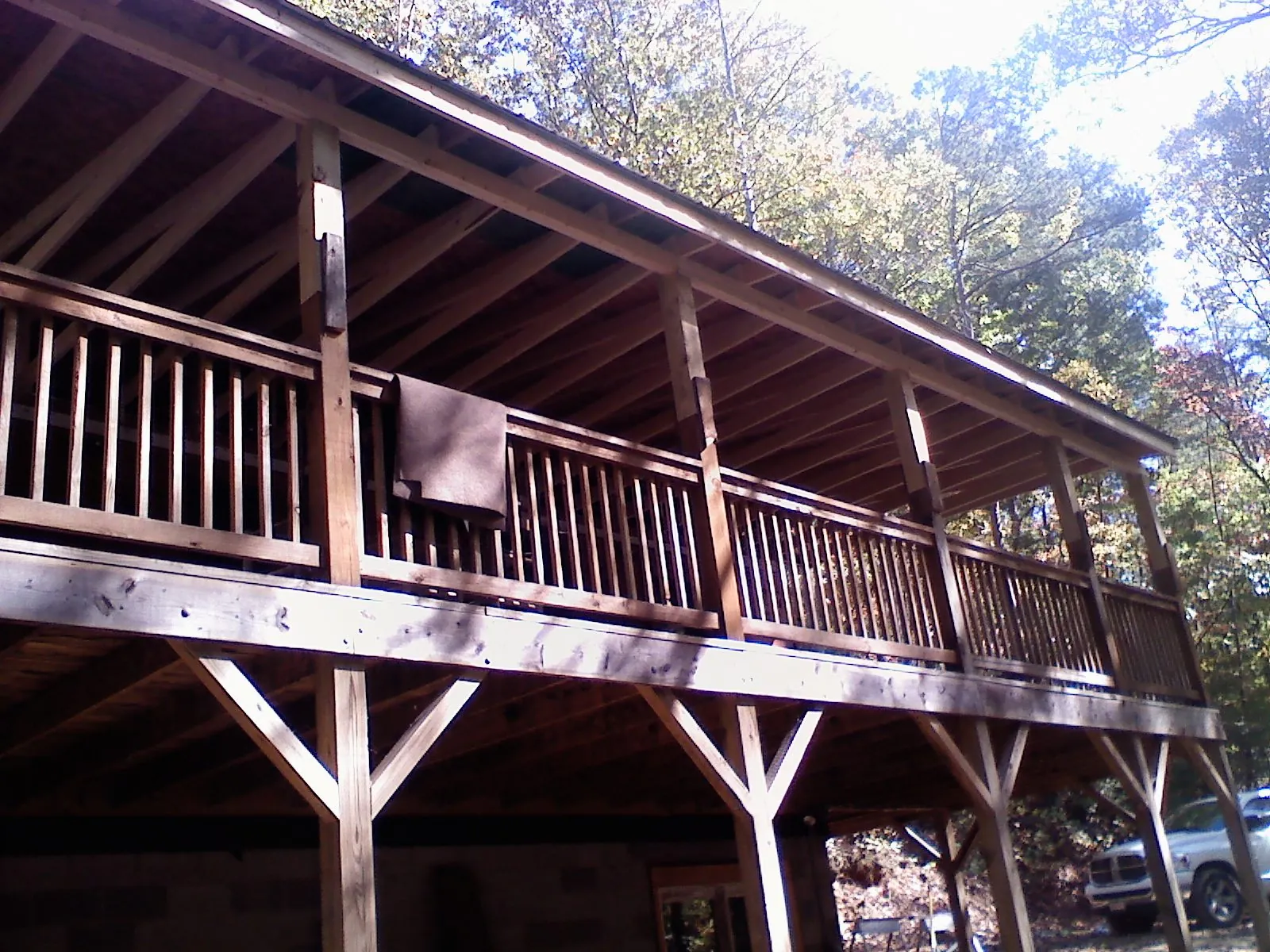 Timber framing under a new elevated porch and deck — Roof Leak Repair in Enumclaw by Roofing Brothers
